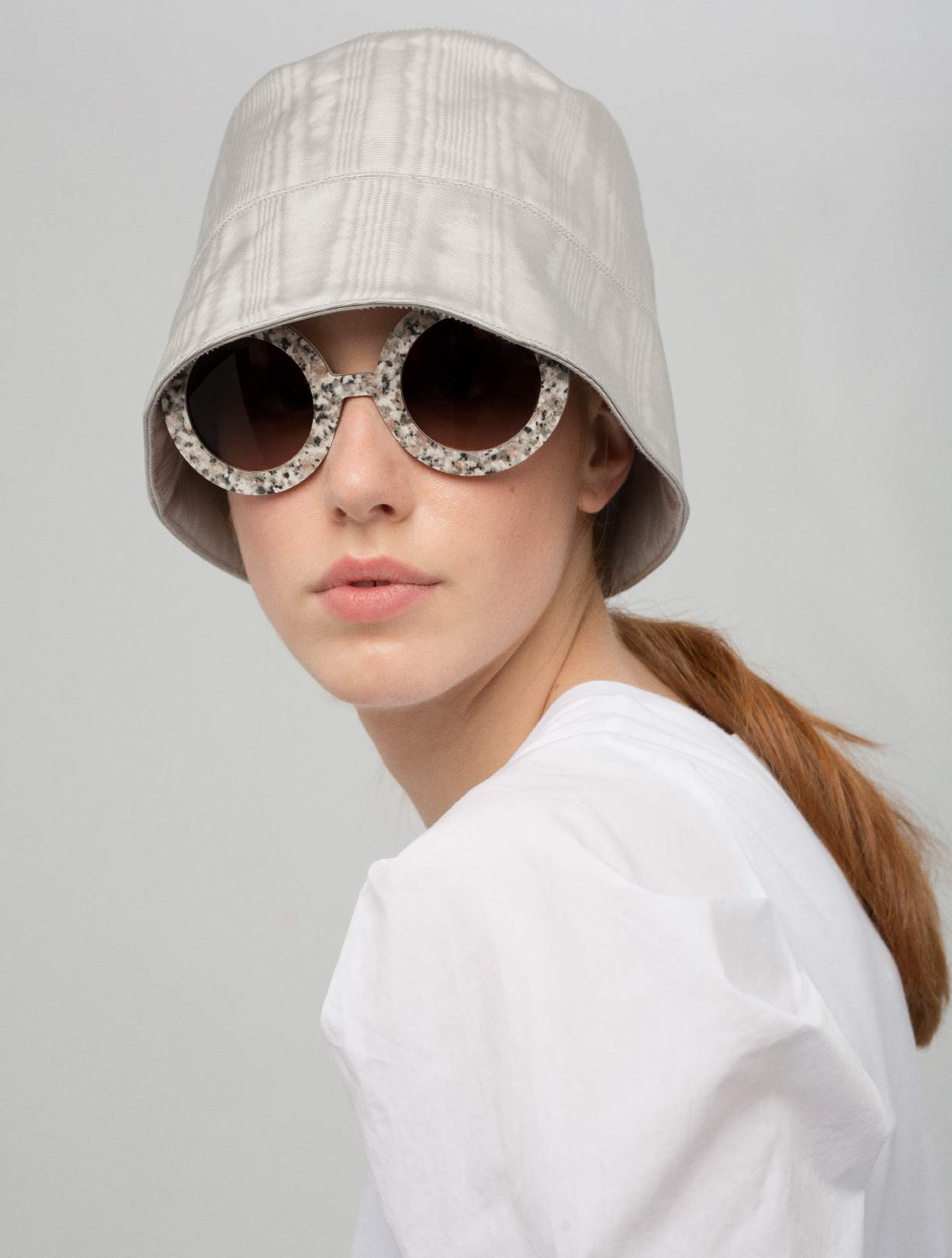 Model wearing distinctive Nina Mûr statement eyewear
